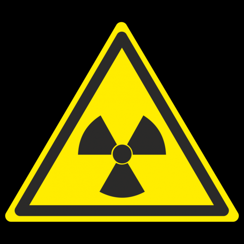 Знак радиации на черном фоне